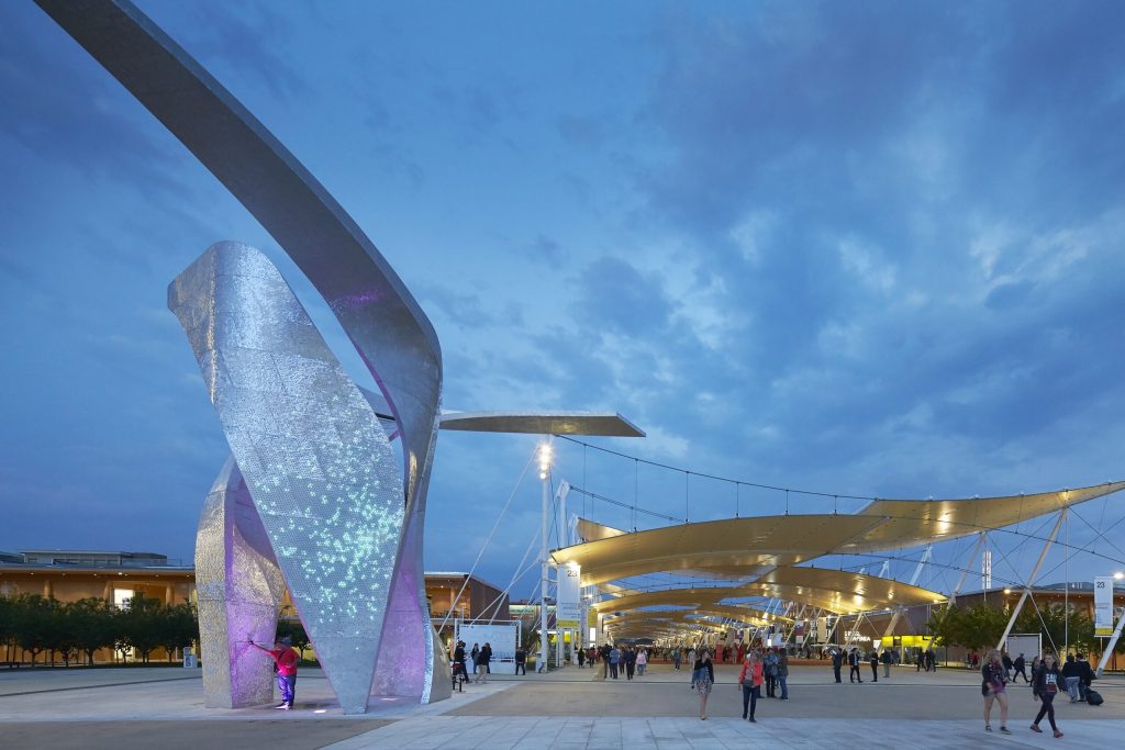 Image showcasing lit-up, swirly structures in Milan