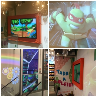 The image is split into four quarters, one is of a green ninja turtle cartoon, one is a wall mounted tv image, one is the wall mounted tv from a side angle and the last quarter is a television wall at the top of a staircase