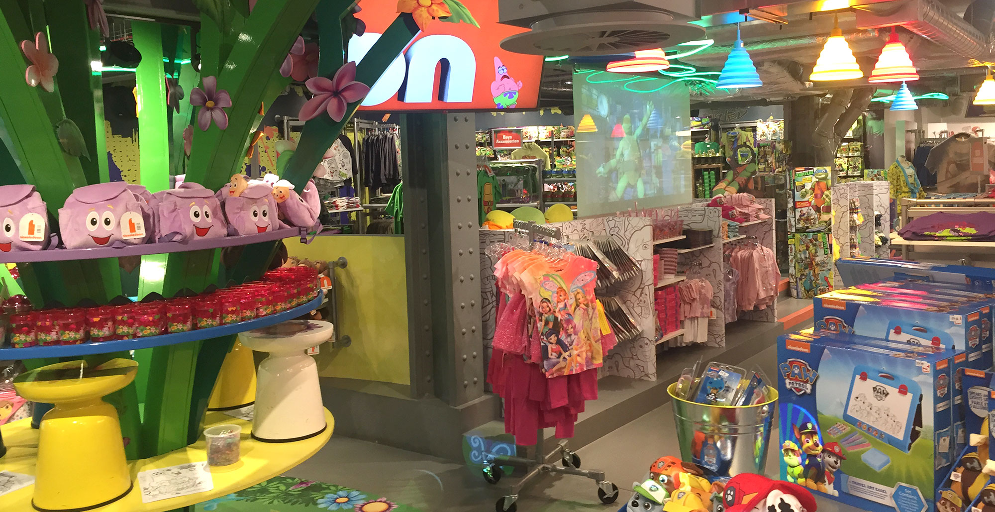 colourful toy store interior with clothing and toys on display